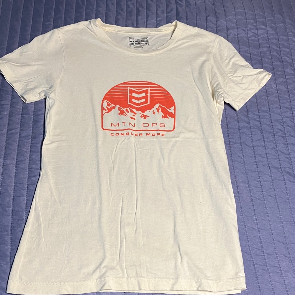 MTN OPS Cream Color T-Shirt with Orange Logo
